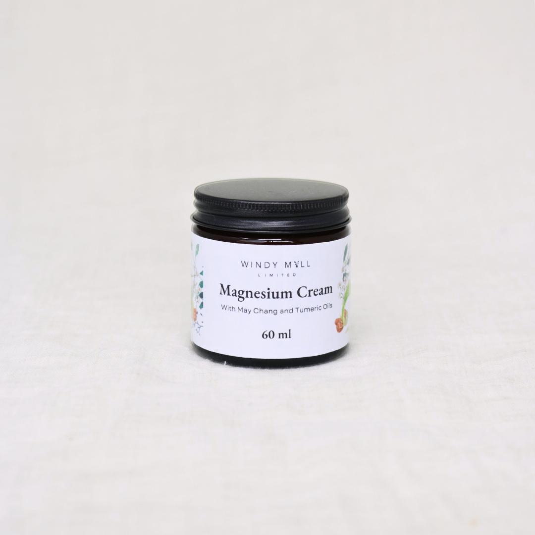 Jar of magnesium cream with a black lid